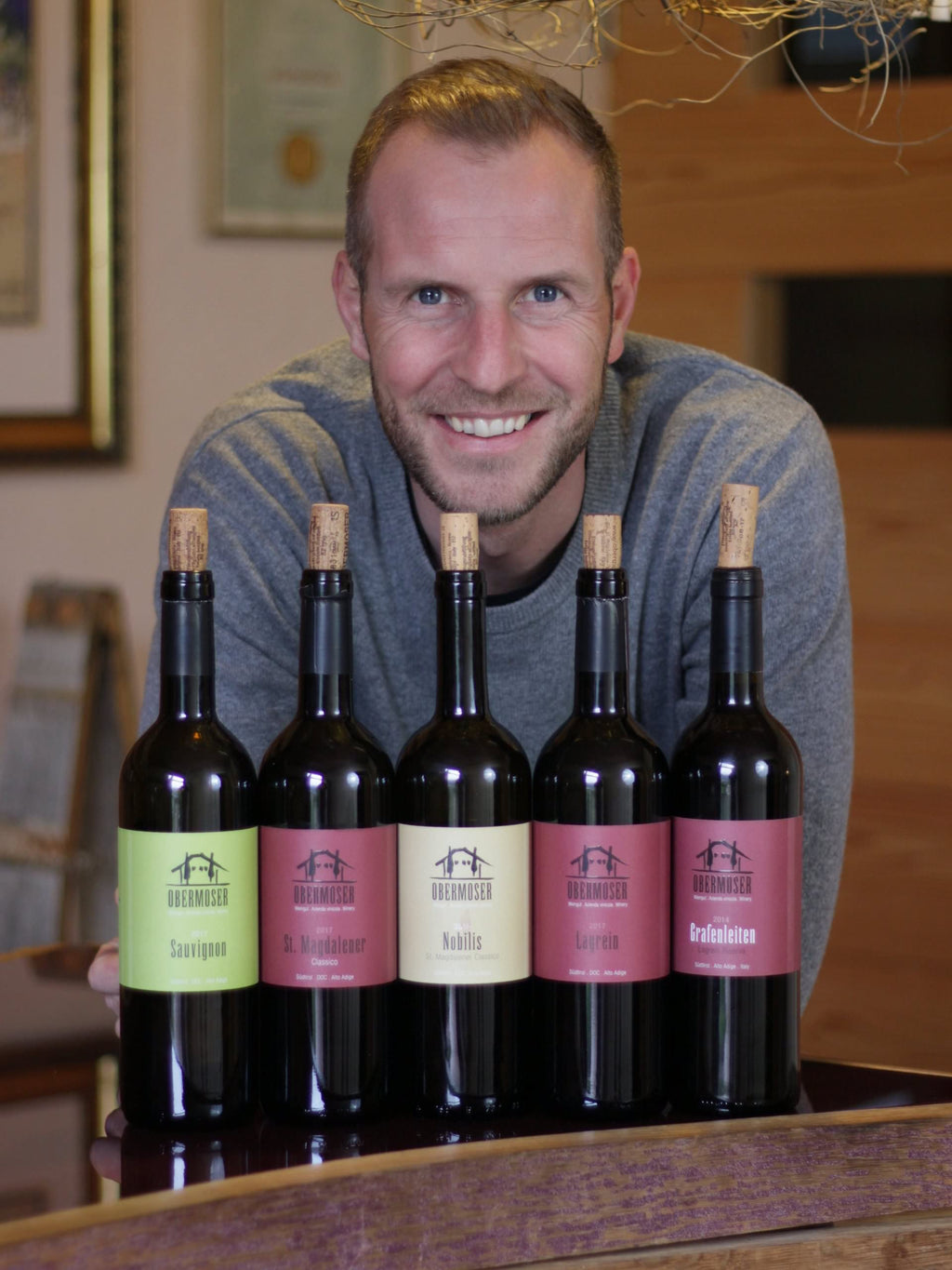 Thomas behind bottles 