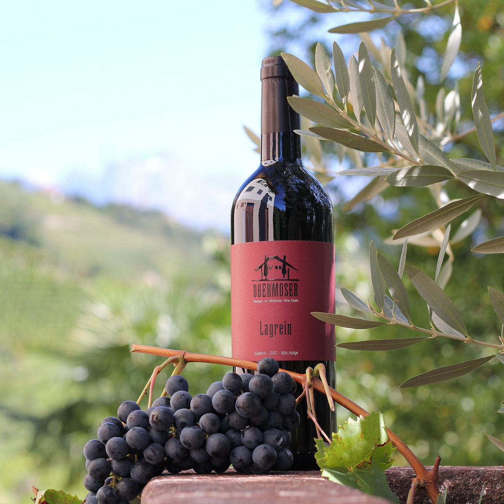 Lagrein-Flasche Starc mit Lagrein-Traube 