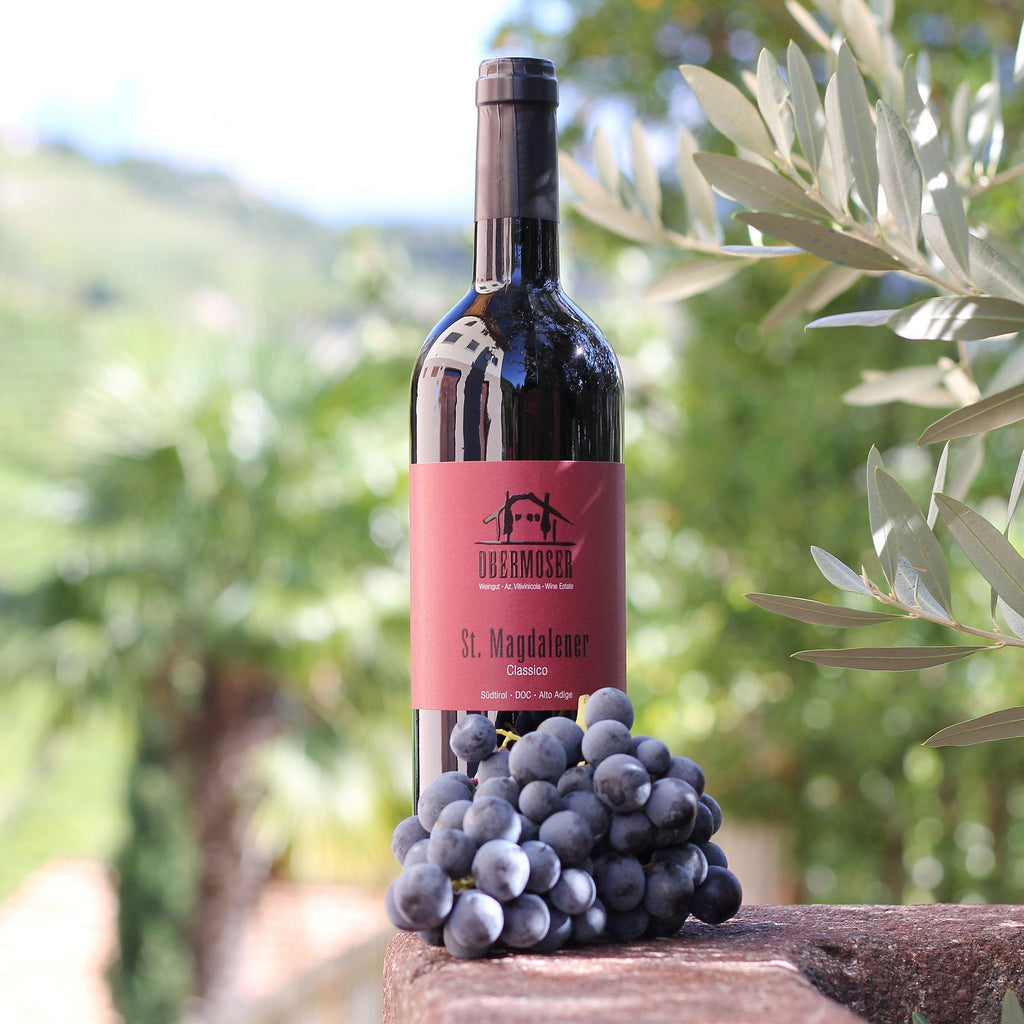 Magdalener Classico bottle and grape 